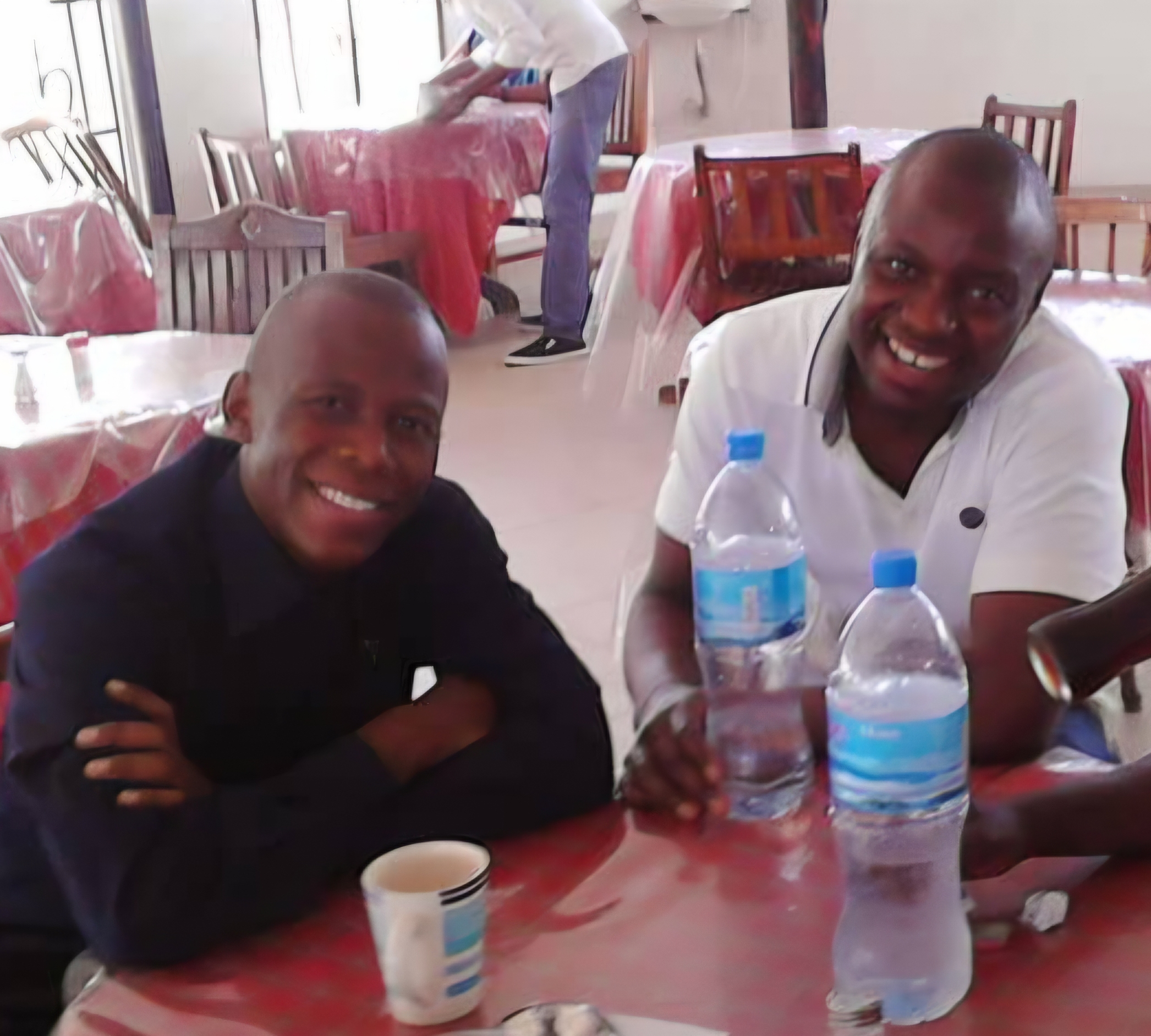 Humphrey Polepole (left) with his brother Tino.