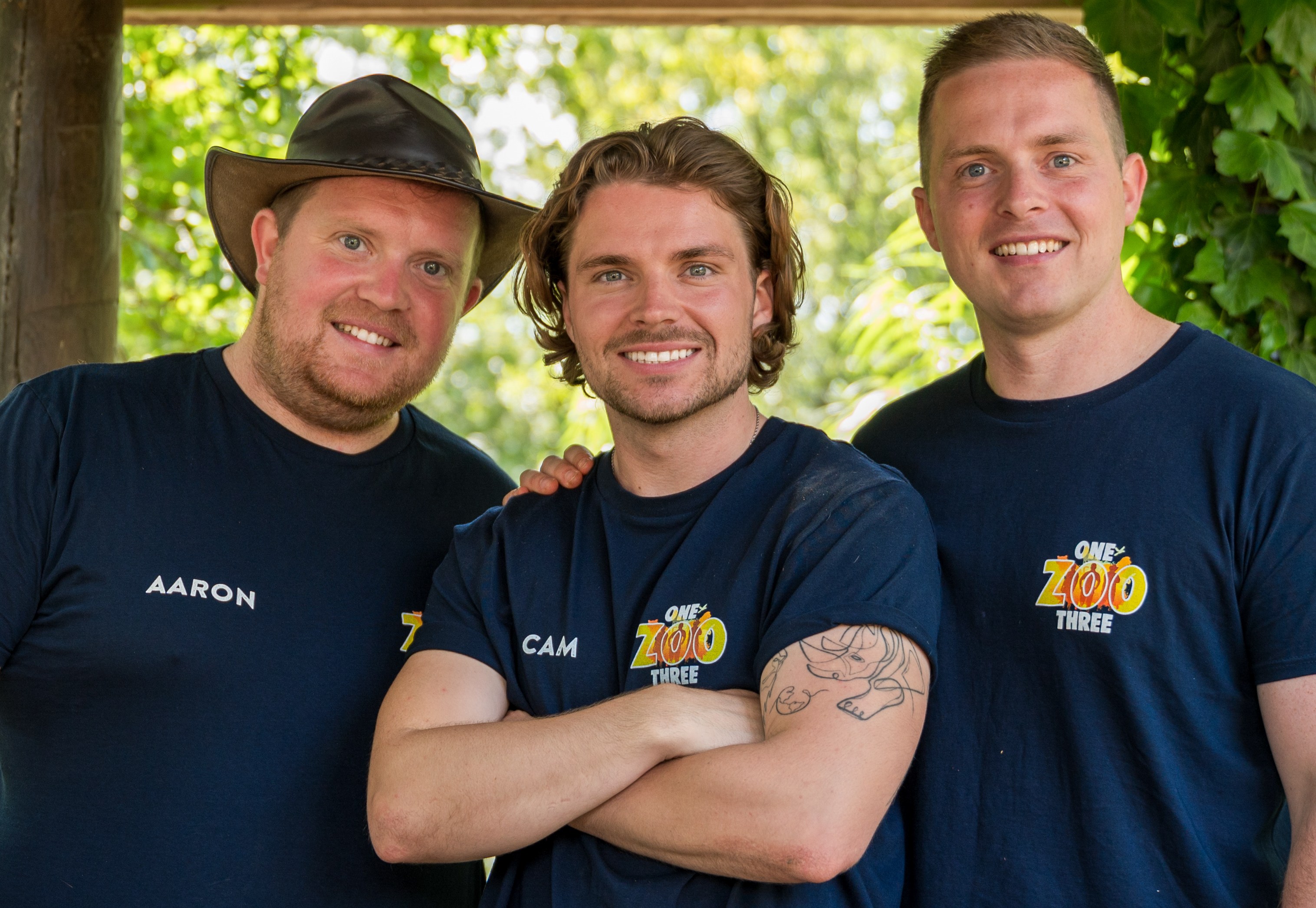 Aaron, Cam, and Tyler Whitnall smiling for a photo.