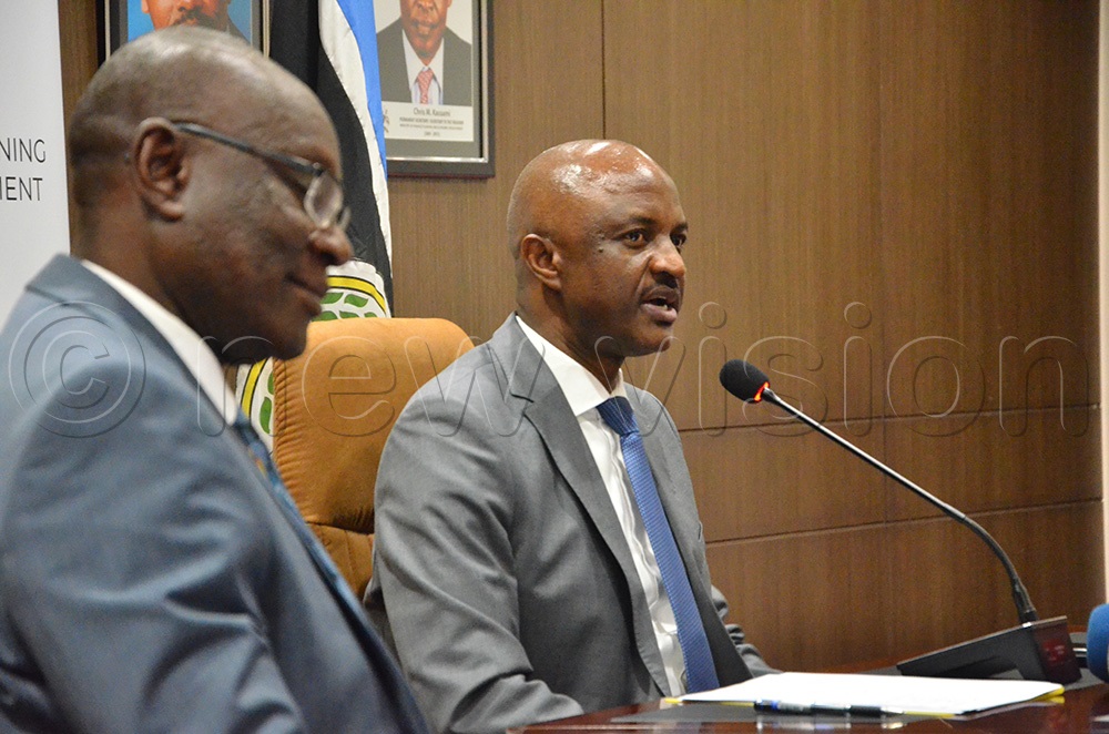 Dr Ramathan Ggoobi, the Permanent Secretary and Secretary to the Treasury (PSST), addressing journalists during a media briefing. (Photo by John Ricks Kayizzi)