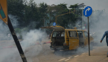 Nigeria police fire tear gas at people protesting the recent mass evictions and demolition of their homes in Makoko and other communities in Lagos, Nigeria, Wednesday, Jan. 28, 2026.