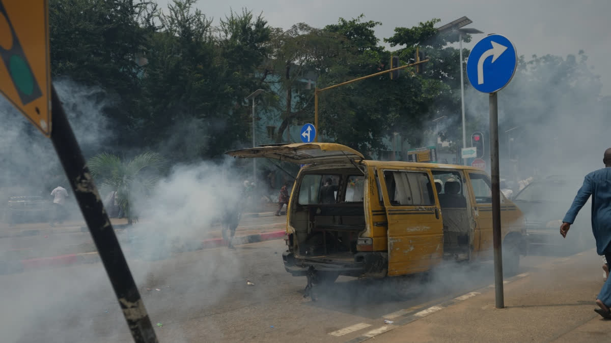 Nigeria police fire tear gas at people protesting the recent mass evictions and demolition of their homes in Makoko and other communities in Lagos, Nigeria, Wednesday, Jan. 28, 2026.