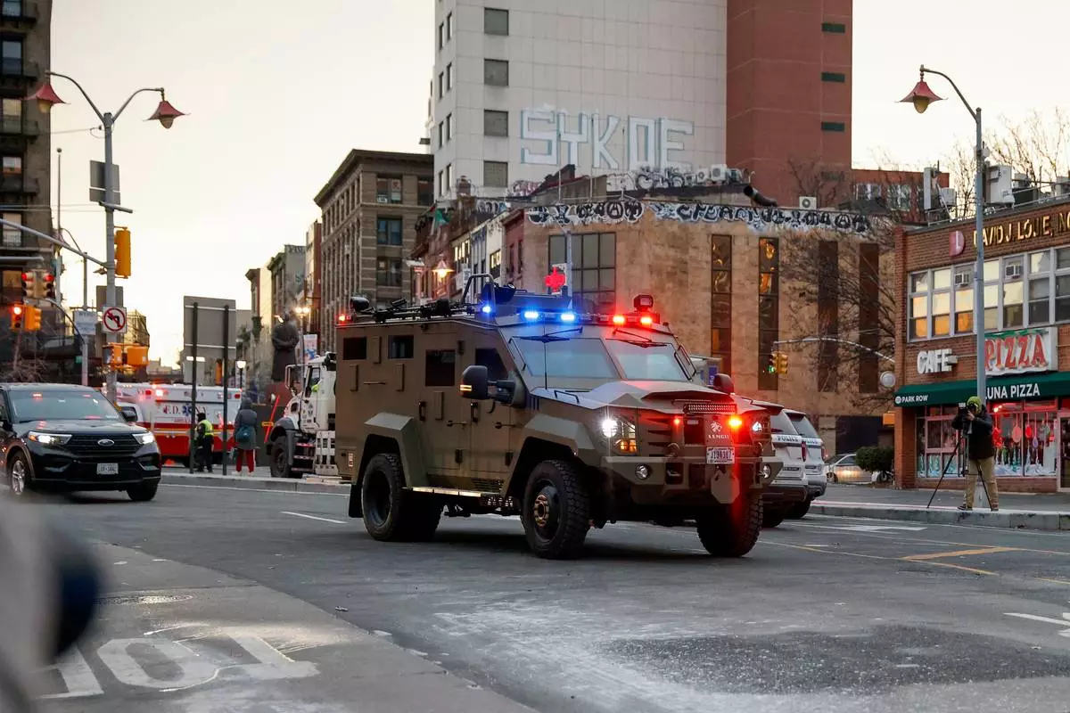 An armored vehicle carrying Venezuelan President Nicolas Maduro and his wife Cilia Flores arrives at Manhattan Federal Court, Monday, Jan. 5, 2026, in New York. (AP Photo/Stefan Jeremiah)
