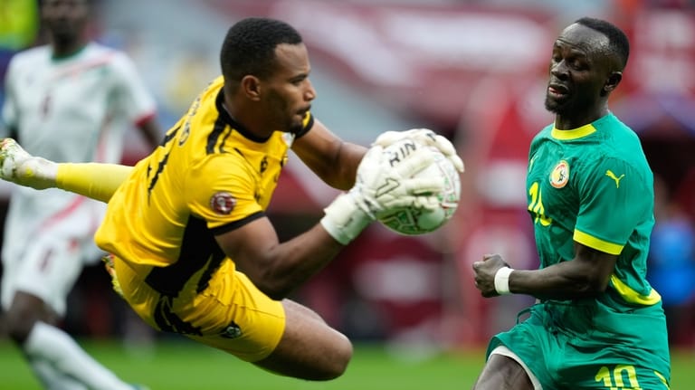 Sudan's goalkeeper Amar Yunis Abdallah Ibrahim saves in front of...