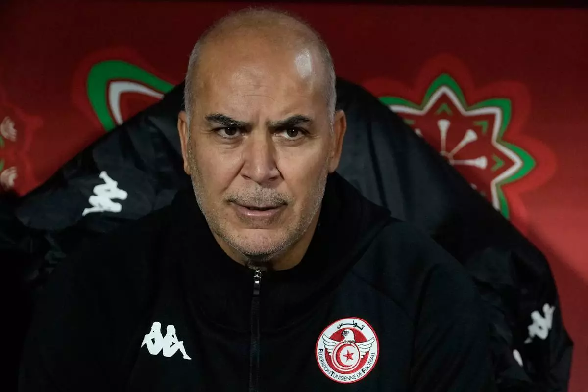 Tunisia's head coach Sami Trabelsi sits on the becnh before the Africa Cup of Nations best of 16 soccer match between Mali and Tunisia in Casablanca, Morocco, Saturday, Jan. 3, 2026. (AP Photo/Themba Hadebe)