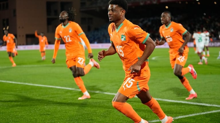 Ivory Coast's Amad Diallo celebrates after scoring his sides first...