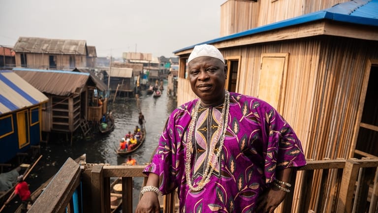 Traditional leader of Makoko, Baale Semede Emmanuel stands outside his...
