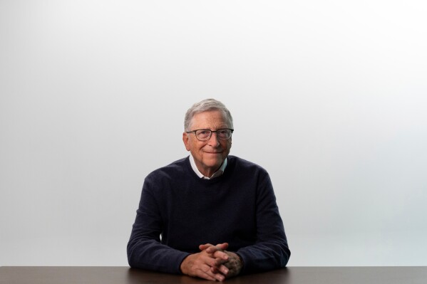 Bill Gates poses for photos after an interview with The Associated Press in Indian Wells, Calif., Jan. 8, 2025. (AP Photo/Jae C. Hong, File)