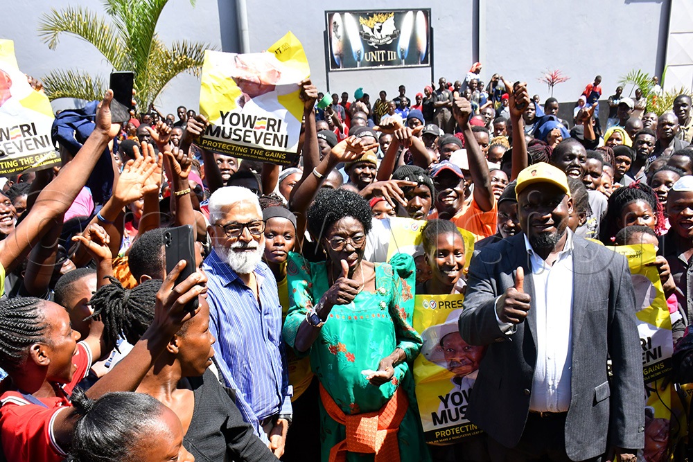  The First Deputy Prime Minister and Minister of East African Community Affairs Rebecca Alitwala Kadaga (middle) in a group photograph with workers of Makepasi Match Limited led by Ranmal Keshwala (on Kadaga's immediate left) the Managing Director of Keshwala Group on Saturday in Jinja City. (Photo by Donald Kiirya)