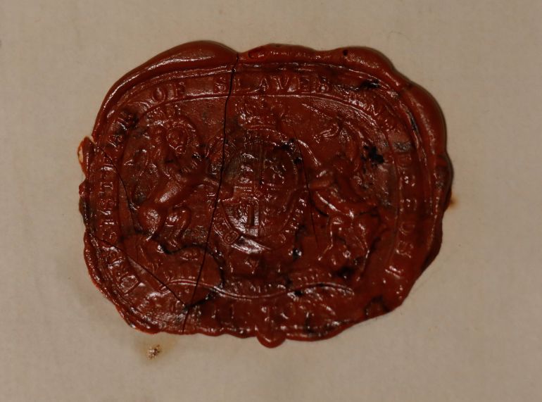 A seal from the Registrar of Slaves and Deeds is seen on display at the Slave Lodge Museum in Cape Town