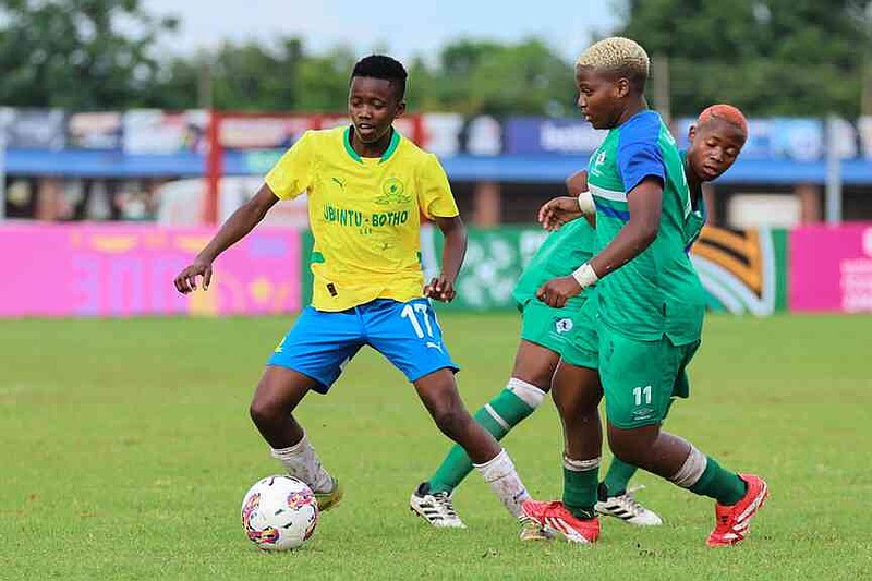 Girls participate in an U-17 tournament promoted by Africa's governing body to promote cervical cancer vaccination in Norton, Zimbabwe, Thursday, Dec. 18, 2025. (AP Photo/Aaron Ufumeli)