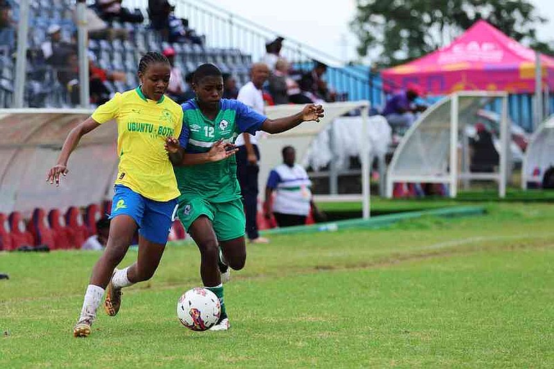 Girls participate in an U-17 tournament promoted by Africa's governing body to promote cervical cancer vaccination in Norton, Zimbabwe, Thursday, Dec. 18, 2025. (AP Photo/Aaron Ufumeli)