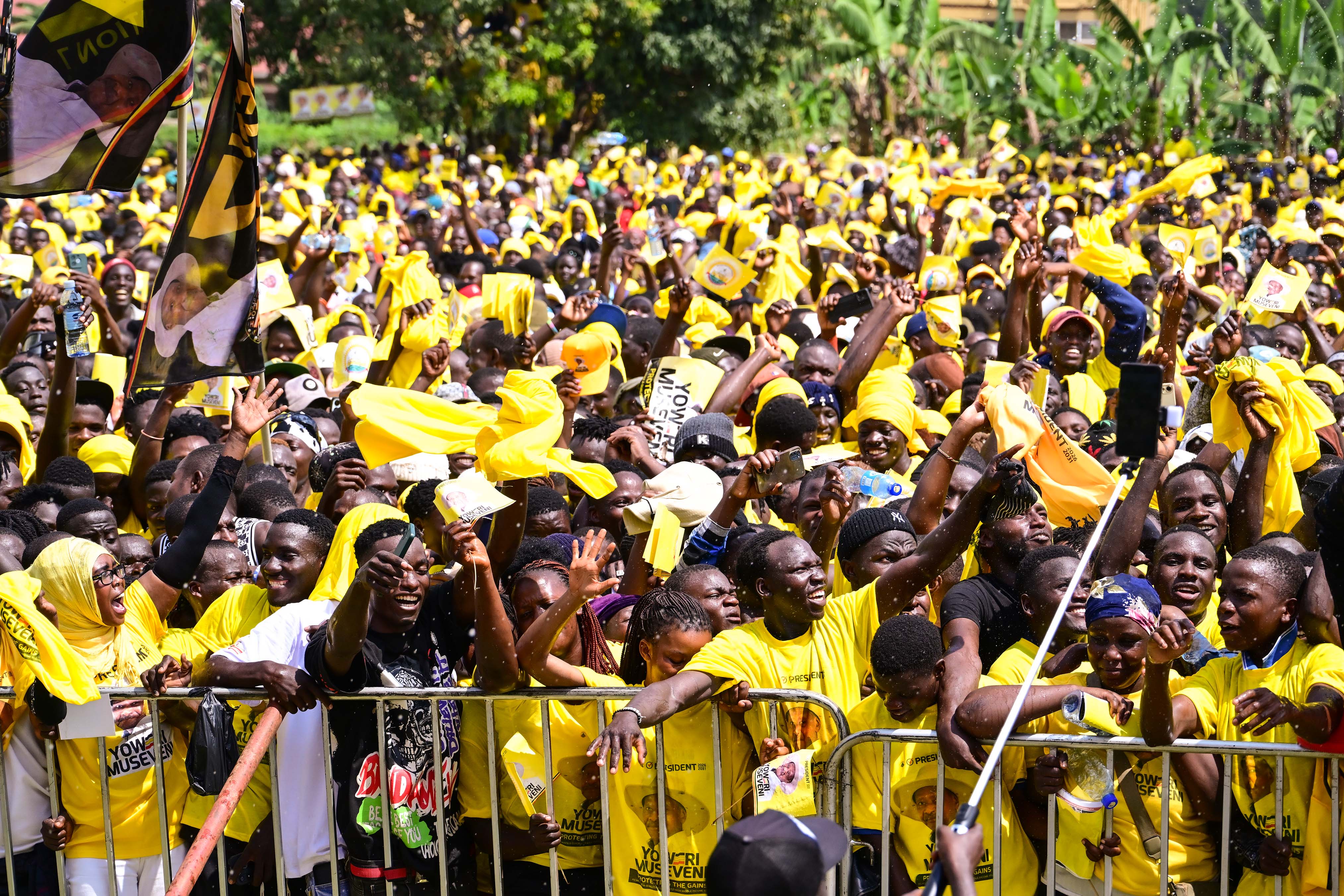 NRM supporters in Mukono district express their excitment as they listened to President Museveni's campaign address during a rally at Naggalama in Mukono district on Friday, January 2. 