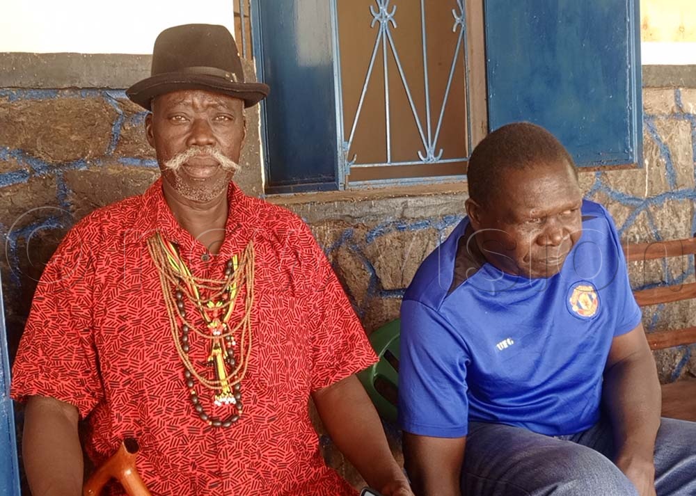 UPC's Bob William Labeja (L) lost the Kitgum  district  LCV seat. (Credit: Christopher Nyeko)
