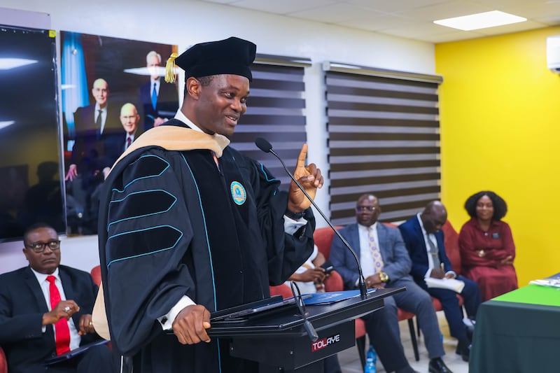 Dr. Victor Ukorebi, senior international area manager for BYU-Pathway Worldwide, speaks to BYU–Pathway students at the completion ceremony in Lagos, Nigeria, Dec. 11, 2025.