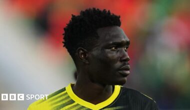 Rogers Mato chips Nigeria goalkeeper Uzoho to score for Uganda at Afcon