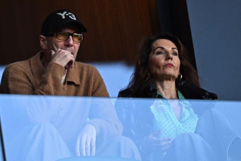 Former French football player Zinedine Zidane and his wife Veronique Zidane watch the Africa Cup of Nations (CAN) round of 16 football match between Algeria and Democratic Republic of Congo at the Prince Moulay El Hassan stadium in Rabat on January 6, 2026. (Photo by Gabriel BOUYS / AFP)