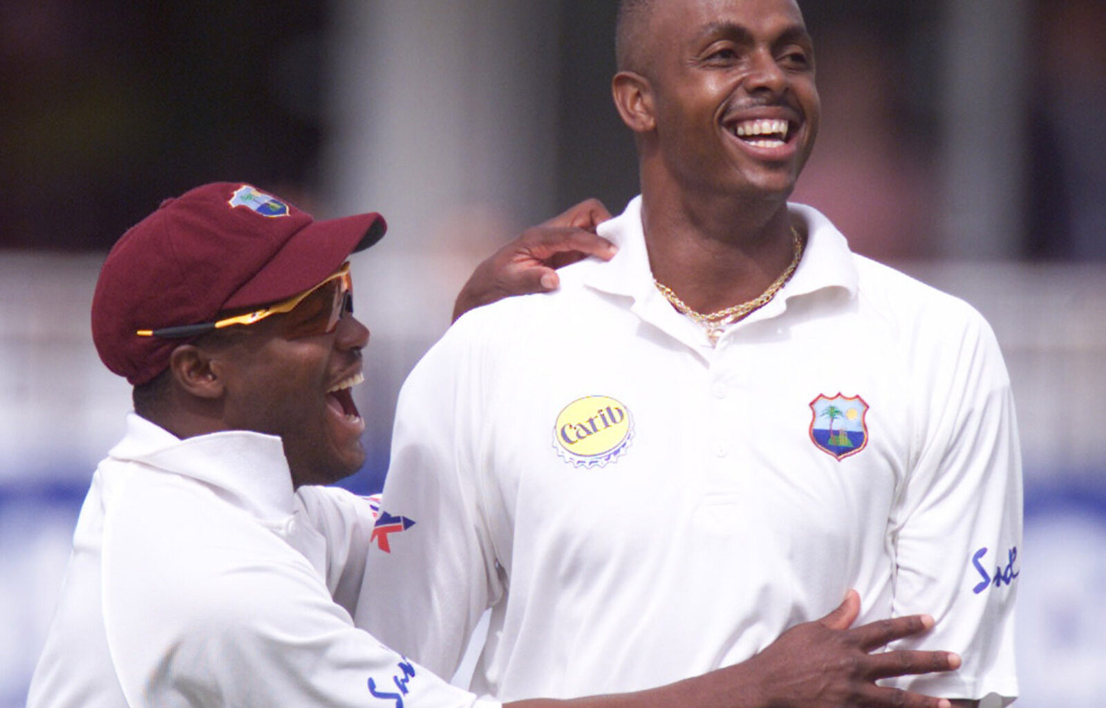 Courtney Walsh (R). (Reuters)