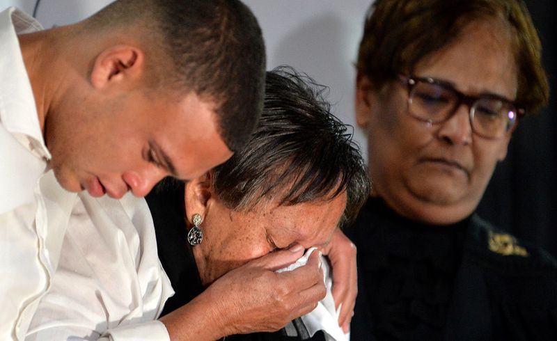 Tracy Brown’s mother, Charmaine Terblanche, is comforted by her grandson, Qiyaam Brown, and her daughter’s colleague and close friend, Urcelle Appolis, during the memorial service on Thursday. (Photo: Deon Ferreira)