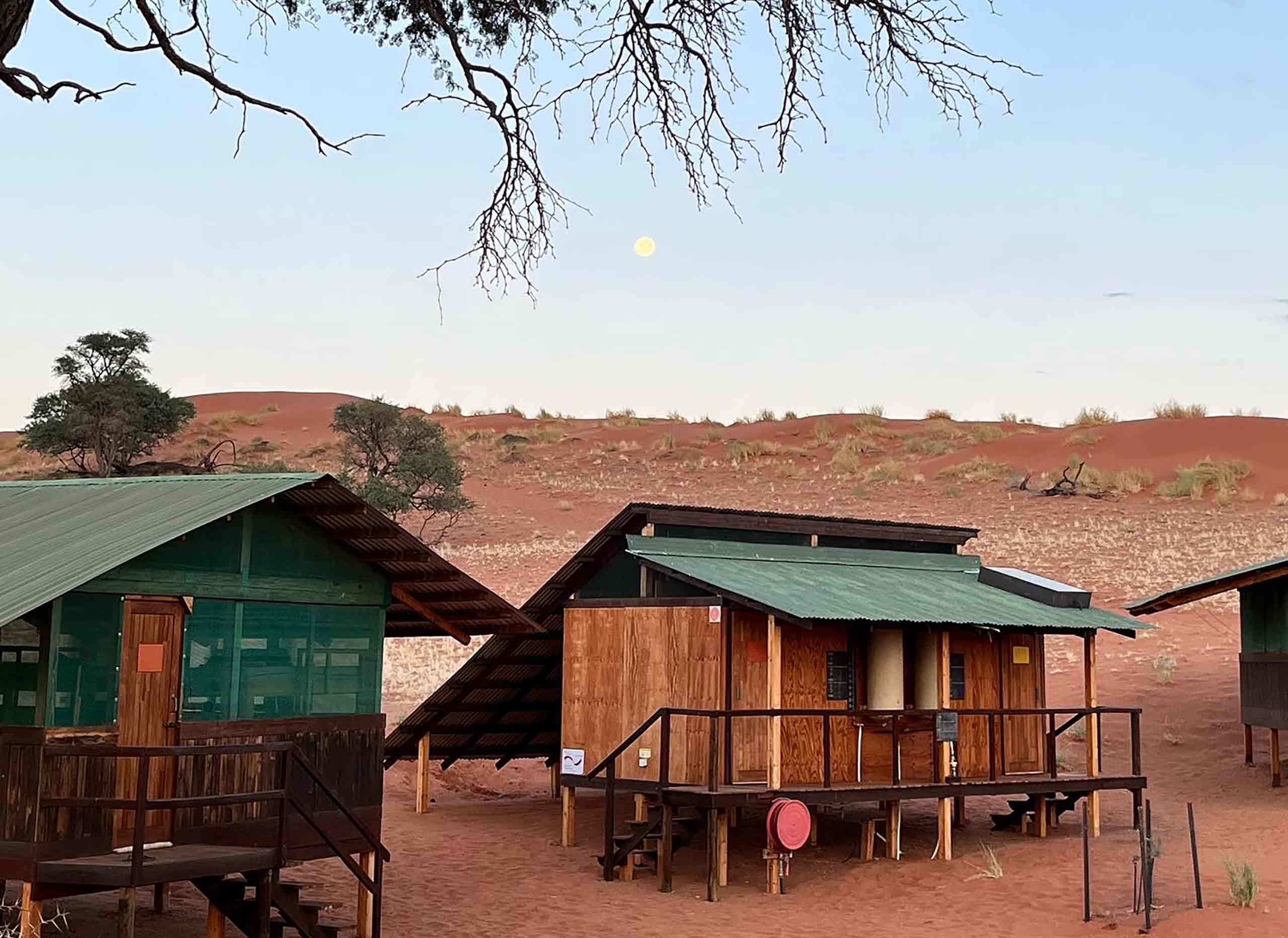 Image of cabins in an arid landscape, Namibia, taken by Emma Nicodemus during her study abroad experience