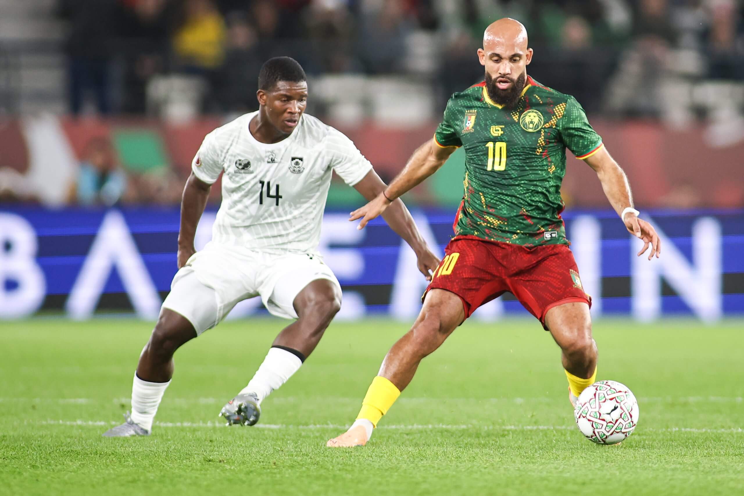 Mbekezeli Mbokazi tracks Cameroon's Bryan Mbuemo