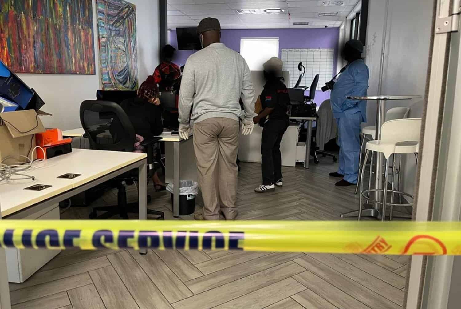 A multi-billion-dollar cybercrime syndicate in Bryanston was raided by the Hawks on Tuesday morning. Picture: Michel Bega