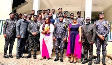 Christian Tetteh Yohuno (4th from right), the IGP, with Grace Ashly and other senior officers of the Ghana Police Service