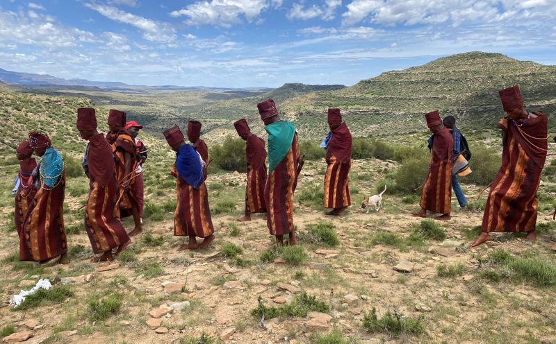 Initiates walking in silence, guided by tradition, with the mountains standing as witnesses. (Photo: Felix Dlangamandla)