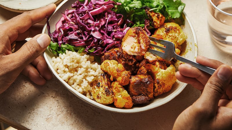 Dr Rupy Aujla’s salmon tikka bowls with quick fennel and cabbage pickle