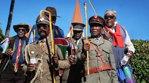 Namibia's Ministry of Information and Communication Technology/Facebook Members of Ovaherero community dressed in their combat cultural attire.