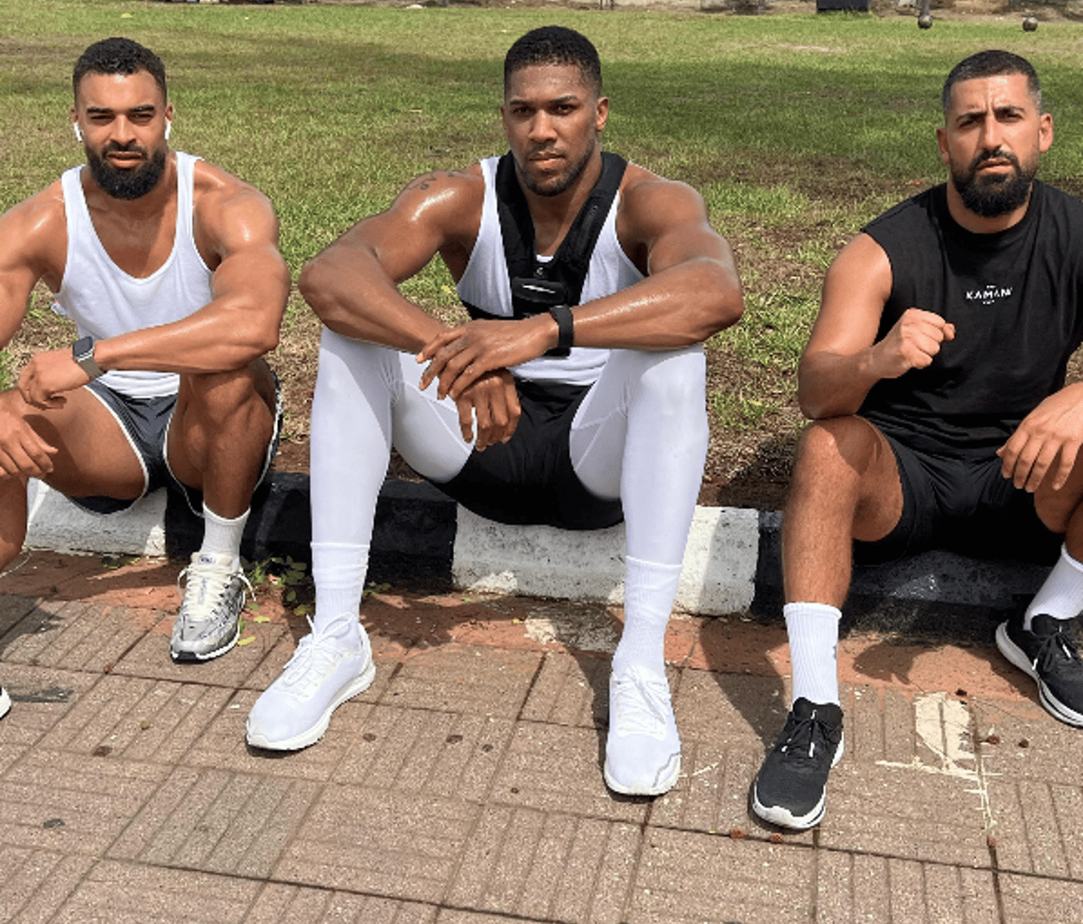 Anthony Joshua returns to UK after Nigeria crash that killed two close friends