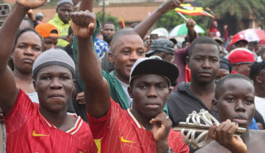 Ugandans choose between pop star and veteran leader in presidential poll