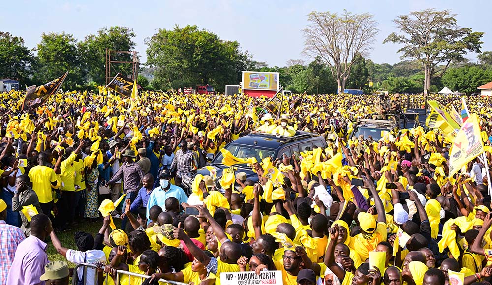 President Museveni who is also the NRM Presidential candidate accompanied by First Lady Janet Museveni waves to his supporters as he arrives at Naggalama in Mukono district to address his campaign rally on Friday. (Credit: PPU)