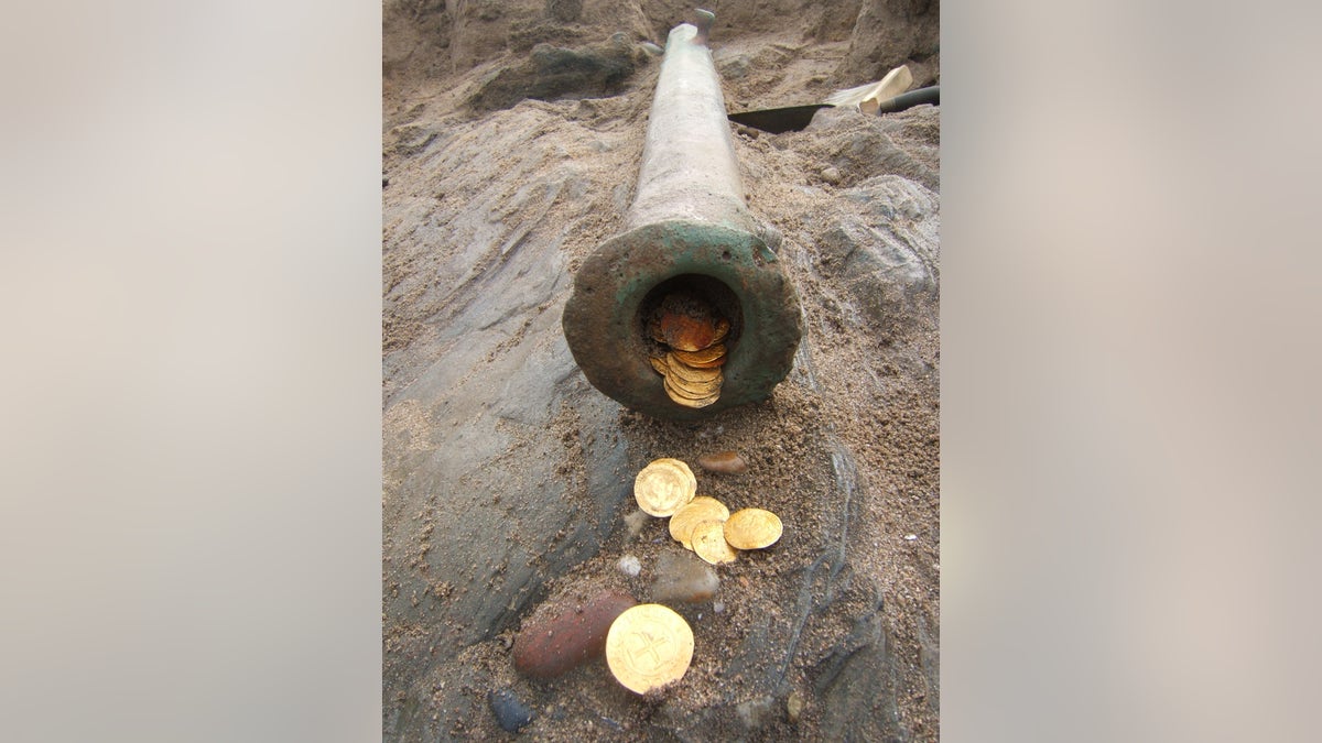Gold coins and a cannon discovered in the Namibian shipwreck