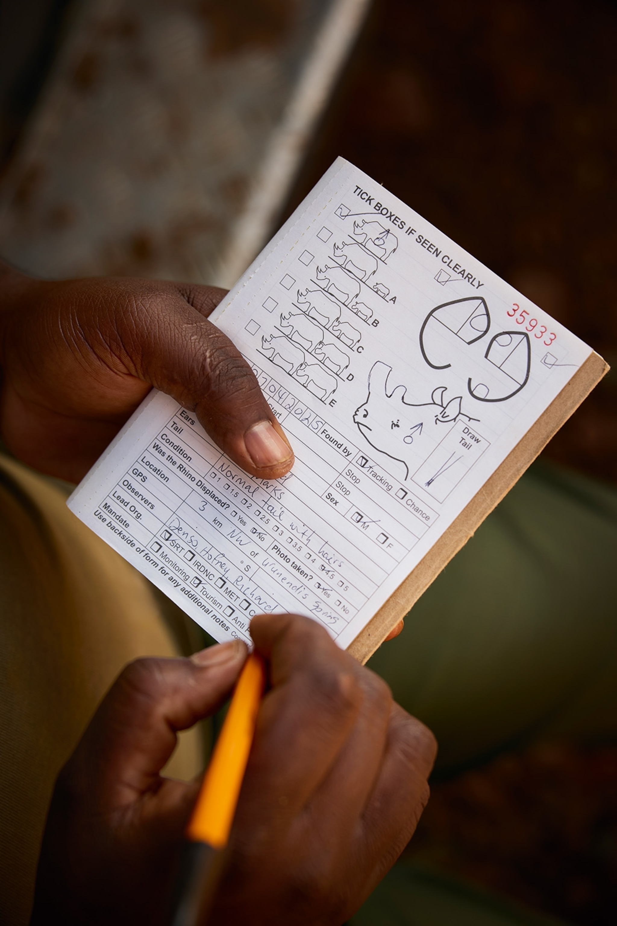 A paper form for marking the characteristics of rhinos.