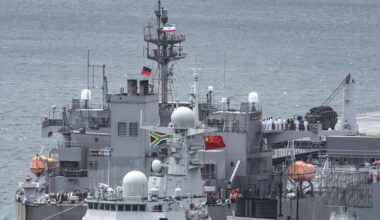 Iranian and Chinese flags fly on two navy ships at Naval Base Simon’s Town on Friday, 9 January. (Photo: Brenton Geach)