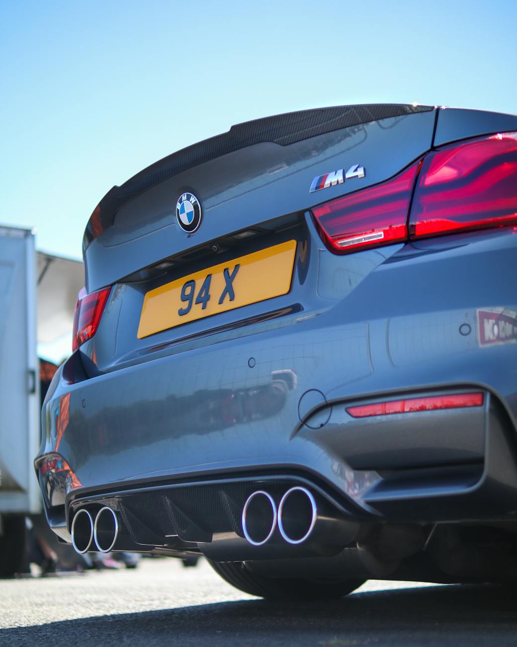 gray car parked on asphalt road