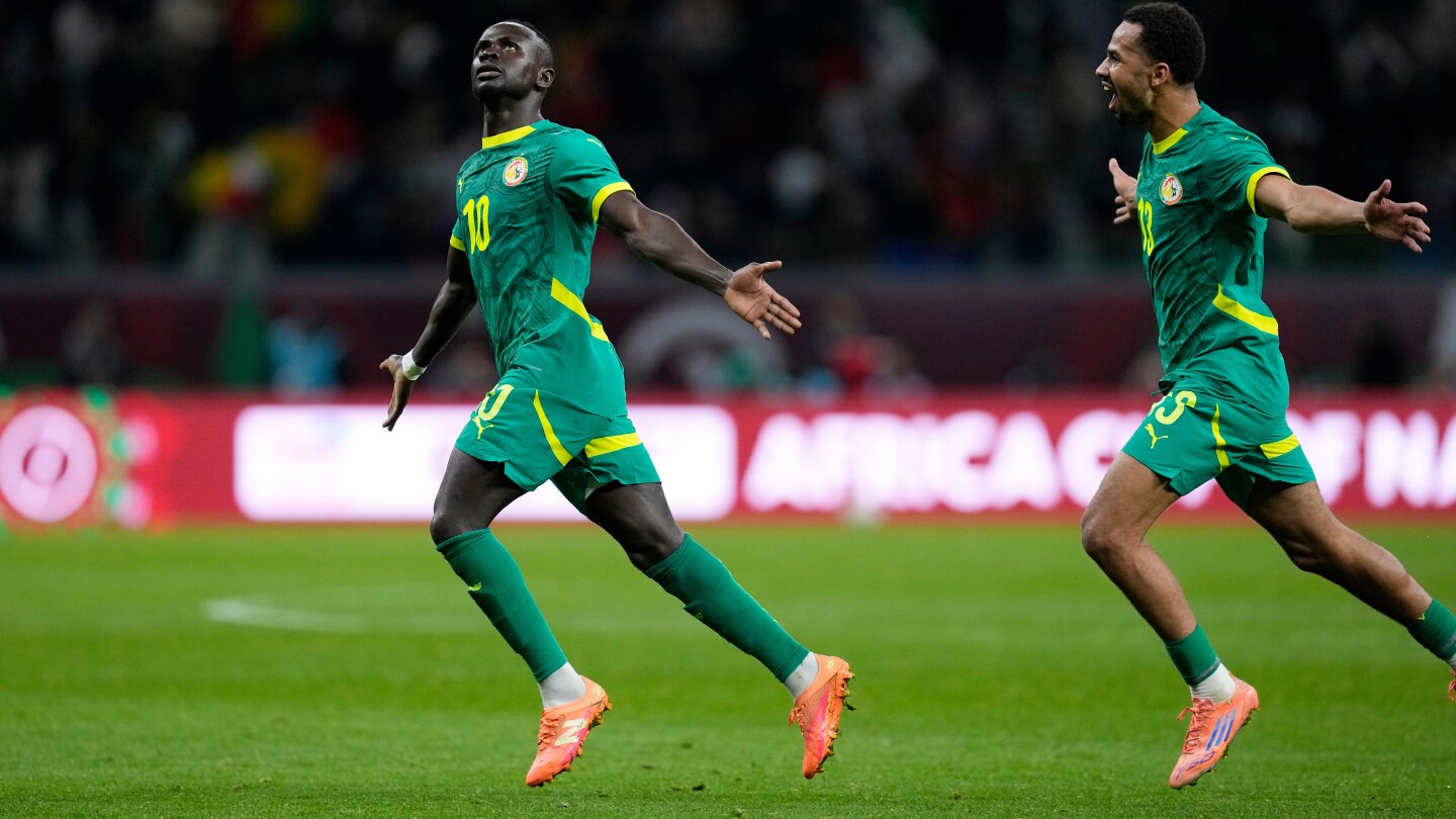 Mané tops Salah again at Africa Cup as late goal sends Senegal into final past Egypt