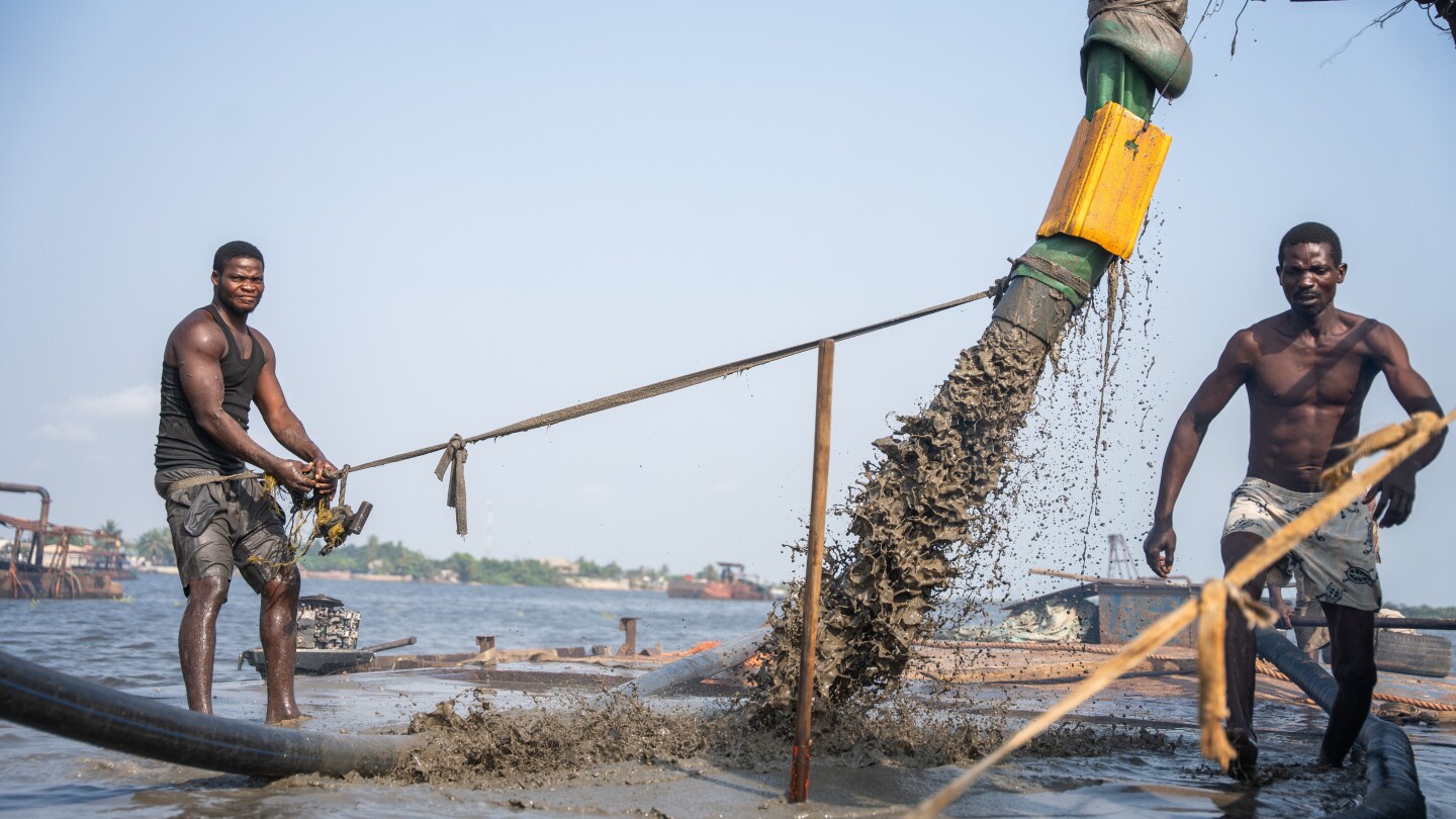 Photos of Nigerian sand dredgers reshaping Lagos’ coastline, one bucket at a time