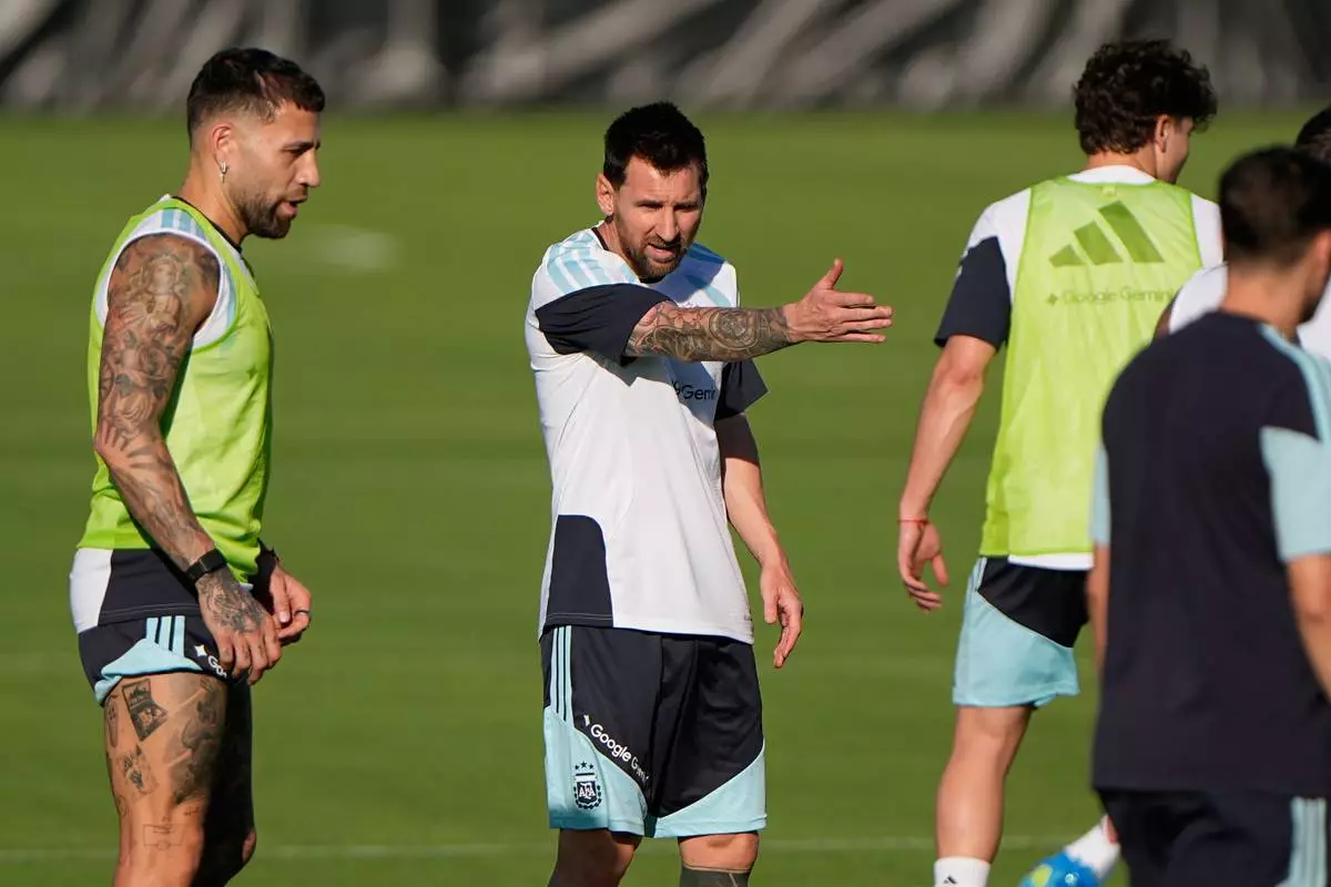 Argentina's Lionel Messi motions during practice for the the FIFA World Cup soccer tournament Thursday, June 11, 2026, in Kansas City, Kan. (AP Photo/Charlie Riedel)