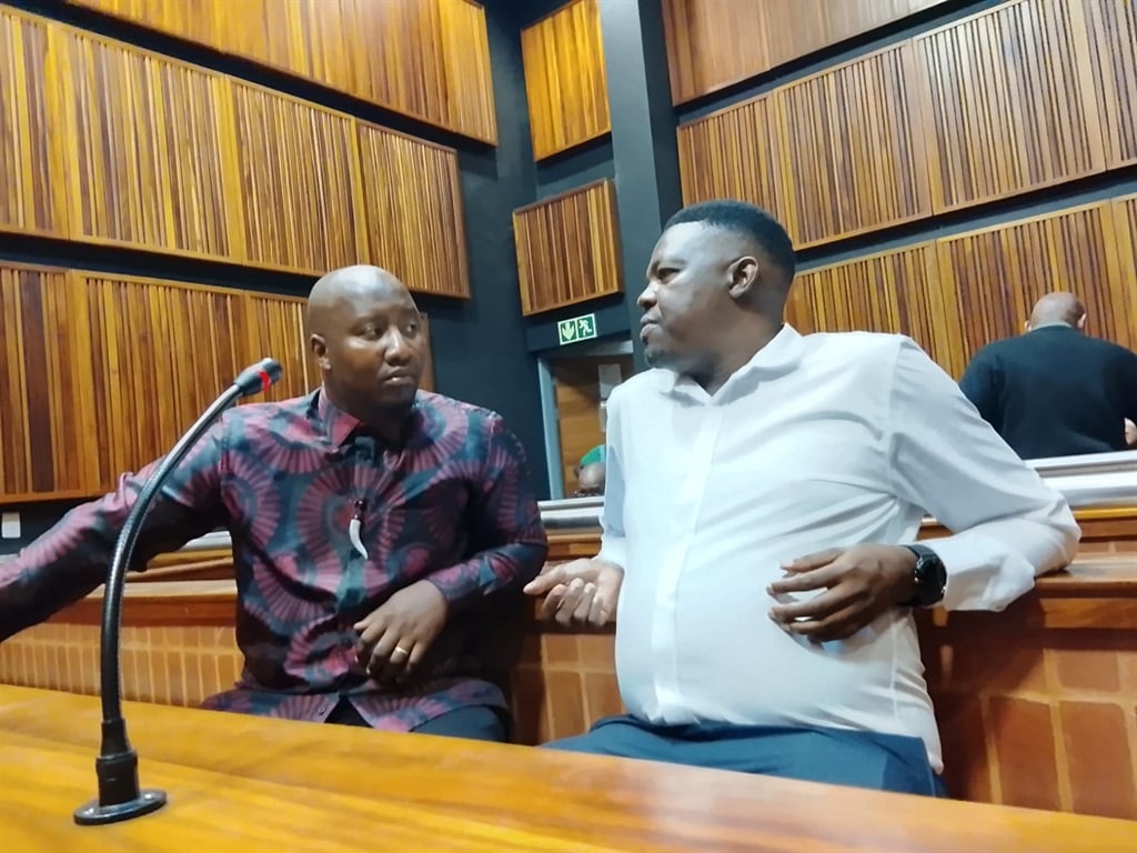 ActionSA Ekurhuleni mayoral candidate Xolani Khumalo and his co-accused Duma Hadabe in the dock in the Palm Ridge Magistrates Court. Photo by Happy Mnguni