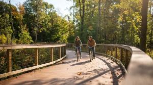 Couple enjoying a bike ride at Wendt Beach in the Town of Evans, NY