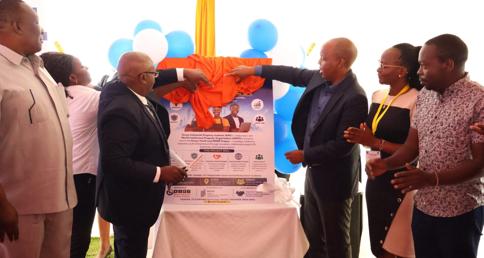 KIPI Secretary Administration Karanja Njora and Board Chairman Allan Kosgey launch the Youth-led MSMEs Project at Eldoret National Polytechnic during an event highlighting innovation and intellectual property support for young entrepreneurs.