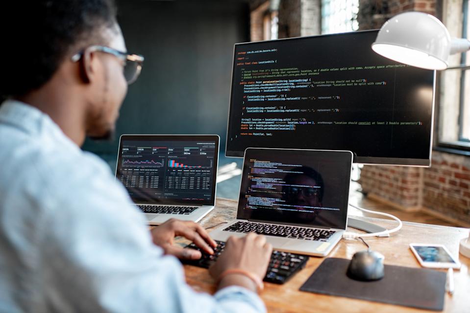 Engineer coding using AI.