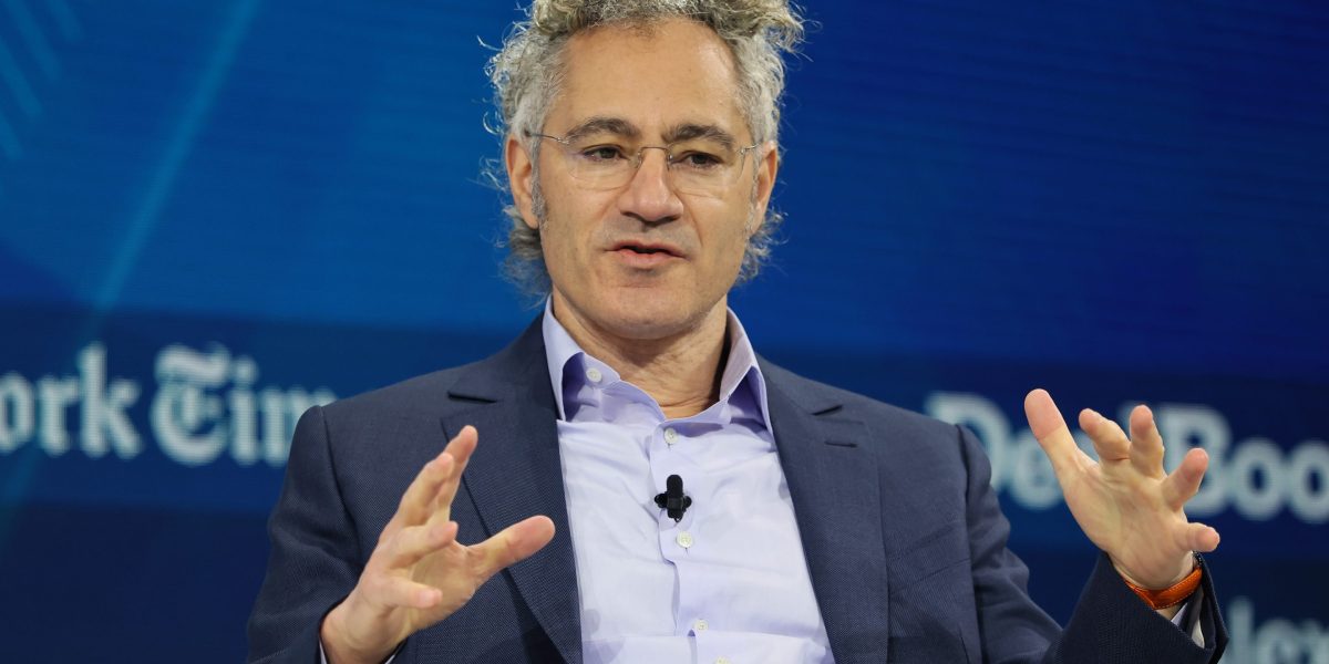 Palantir CEO Alex Karp says executives who brag about their AI cuts might as well 'sign up for the Bernie Sanders manifesto'