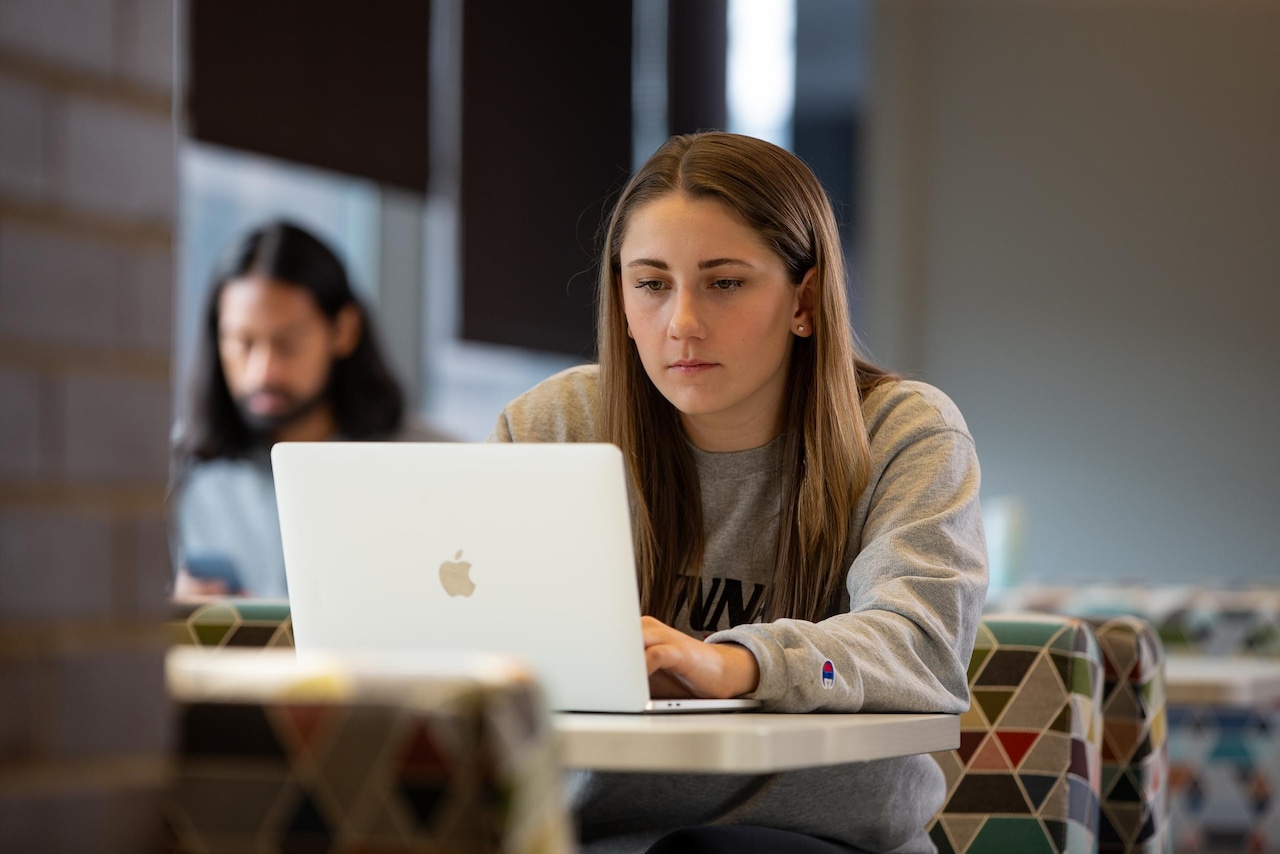 University of Cincinnati student studying library