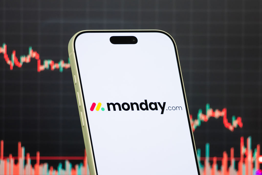 In this photo illustration, a smartphone displays the logo of Monday.com Ltd.