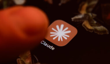 The Claude app icon is displayed on a smartphone screen