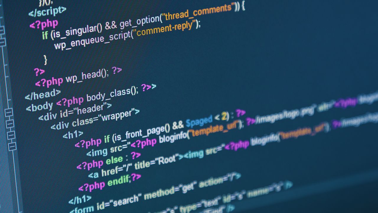 Code of web page displayed on a computer monitor