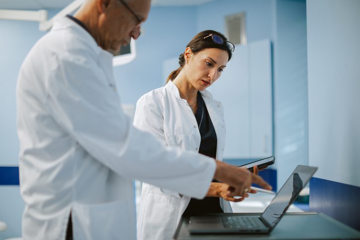 doctors looking at drug analysis with ai