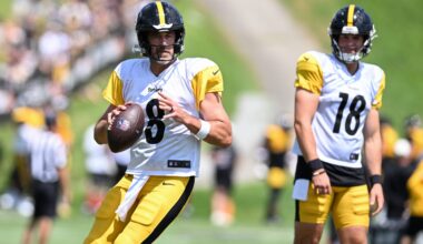 Aug 03, 2026; Latrobe, PA, USA; Pittsburgh Steelers quarterbacks Aaron Rodgers (8) looks to throw a pass as Will Howard (18) watches during a practice session at Training camp at Saint Vincent College.